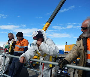 Four plumbers having a tea break.