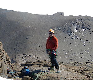 Expeditioner wearing helmet and harness at the start of Fang Peak climb
