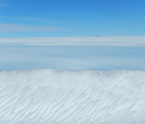 Distant peak on the icy plateau