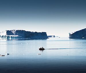 Boating at Mawson on a sunny, glassy calm day.