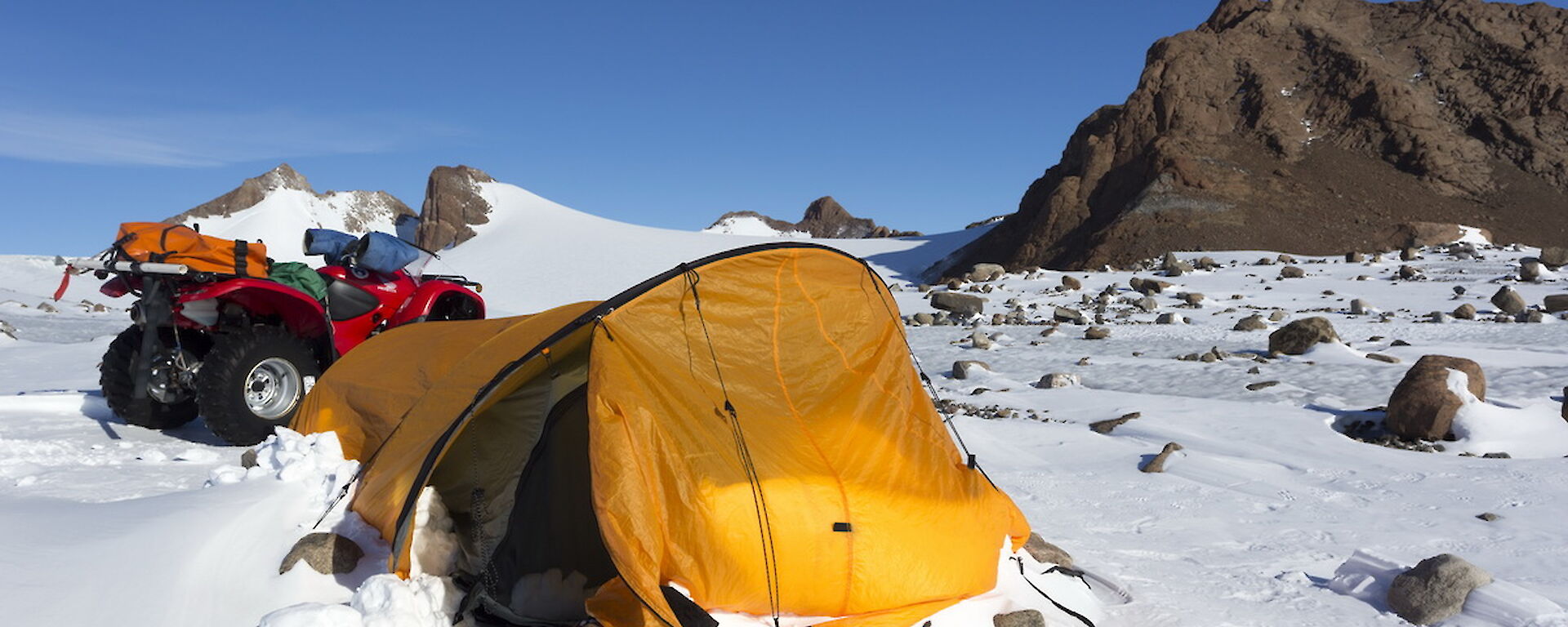 Tent with snow build up outside