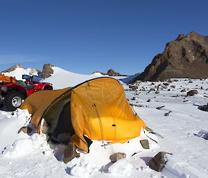 Tent with snow build up outside