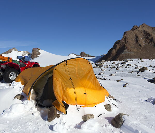 Tent with snow build up outside