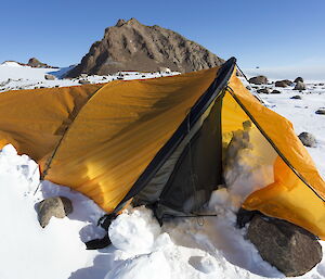 Tent with snow build up