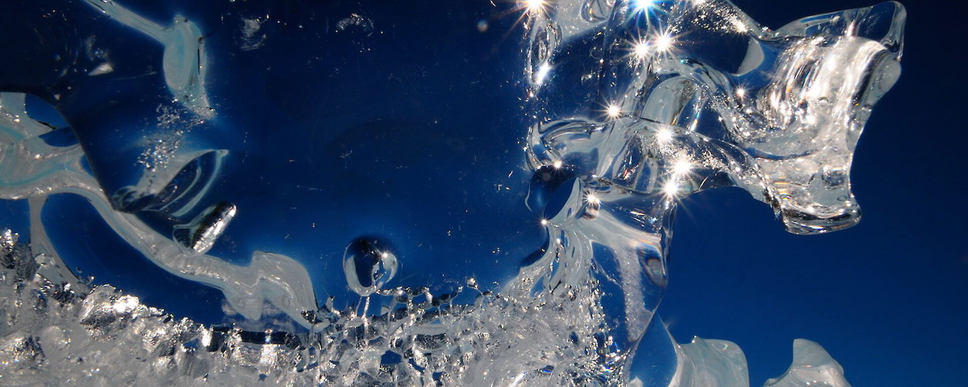 Sun flash in ice crystal