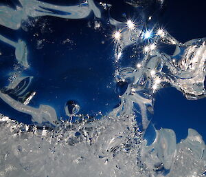Sun flash in ice crystal