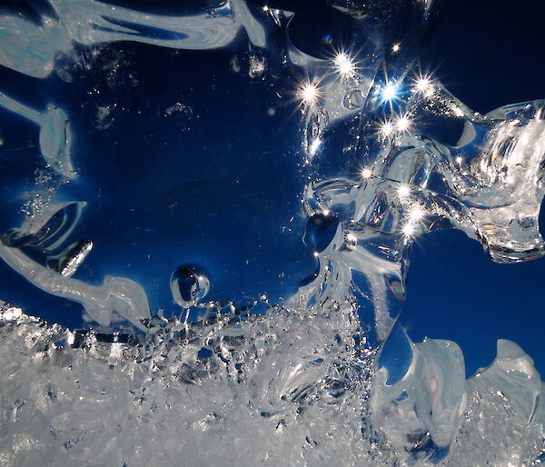 Sun flash in ice crystal