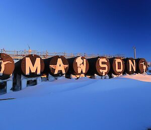 The sun setting on the Mawson fuel tanks