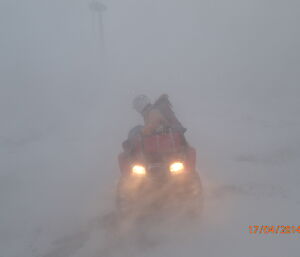 Quad Bike in snow blizzard