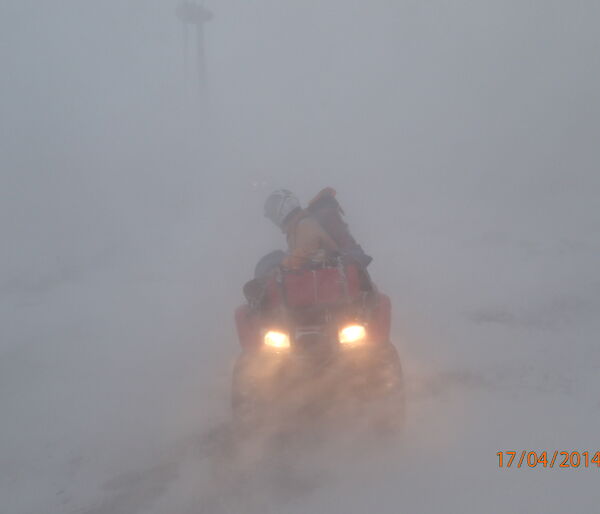 Quad Bike in snow blizzard