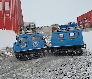 Hägglunds vehicle driving around Mawson station