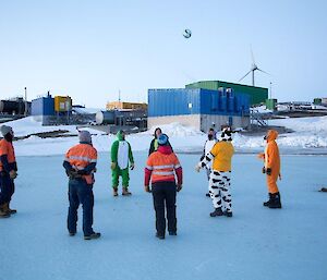 A circle of expeditioners passing the ball around