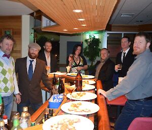 The guys gathering at the Katabatic Bar for drinks before dinner