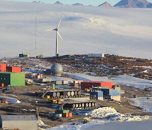 A view of Mawson station from a helicopter with the wind turbines in view