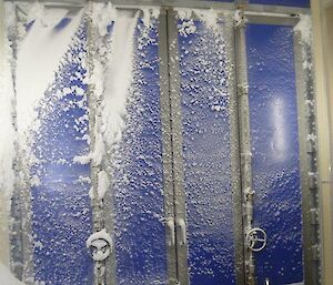 Snow accumulation inside the balloon building after a blizzard