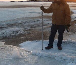 A pressure fountain caused by drilling the sea ice to test its depth