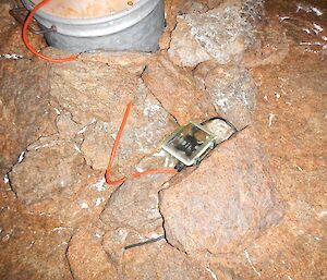 The wind generator’s control box, firmly embedded within some rocks