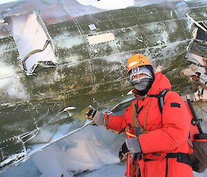 Chris standing in front of the Russian aircraft