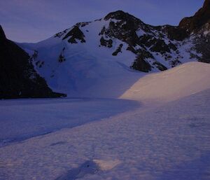 The frozen Northdoodle Lake with the North Masson Ranges in the background