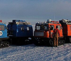 The blue and orange Hägglunds with the RMIT van in tow up on the plateau