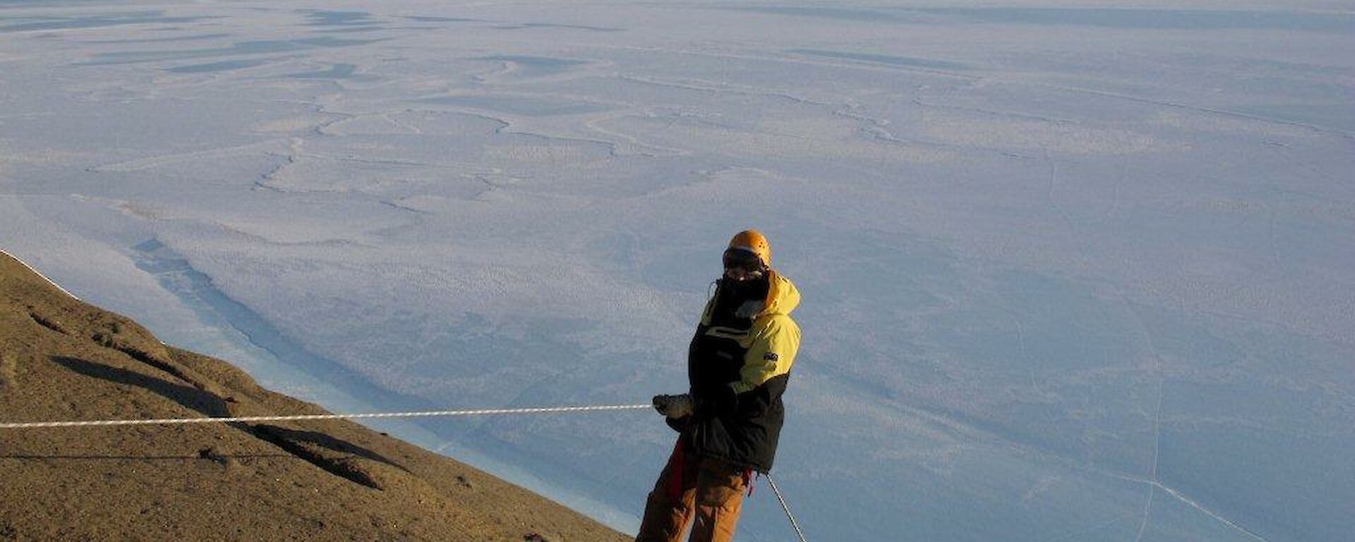 An expeditioner abseiling off the edge of West during a search and rescue exercise