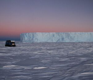 A Hägglunds taking an iceberg tour in the vicinity of Macey Hut and Auster Rookery