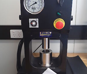 Equipment on a desk with dials and gauges