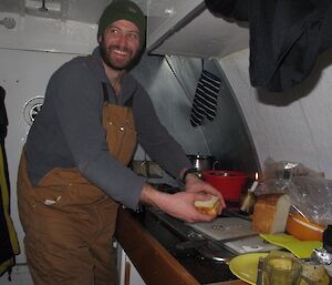 James making toasties for everyone inside the RMIT van