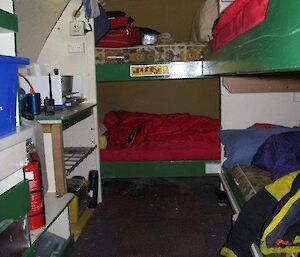 Inside the self contained RMIT van with bunk beds, a kitchen and a pantry