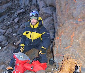 James spots orange lichen on a rock whilst on a climbing trip to Rumdoodle Peak
