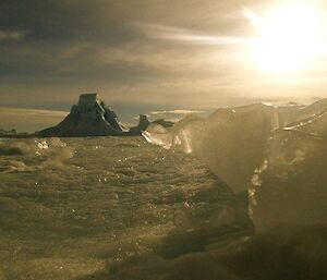 An ice berg frozen in the sea ice