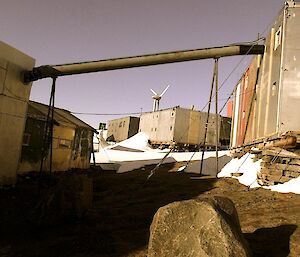 The old station meets the new — the old heritage station with the new world turbine in the background