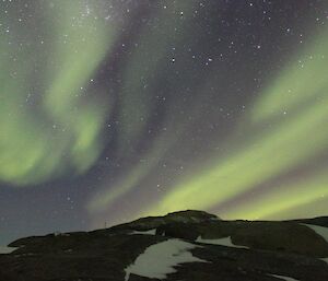 Lydia’s first in-focus aurora photograph — a beautiful green aurora above Macey Island