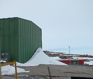 A bliz tail that has formed at the end of the green store from a recent blizzard