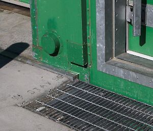 Evidence Stay has been at Mawson with a paw print captured in a concrete slab outside a station building