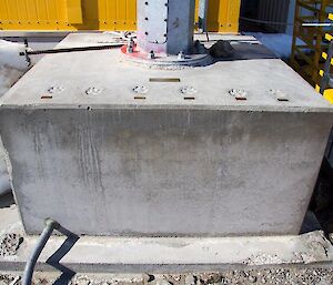 Concrete plinth with Husky paw prints