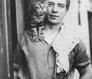 Perce Blackburow with Mrs Chippy (ship’s cat on the 1914 Endurance expedition)