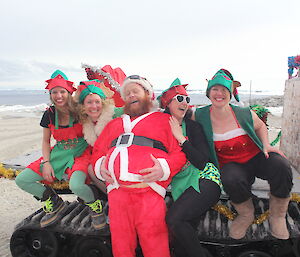 Santa and his four helpers as they arrived at station