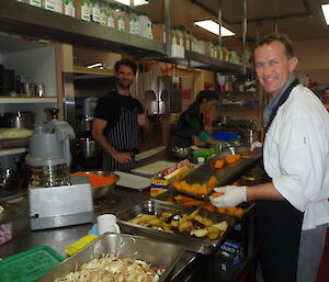 The chefs in the kitchen preparing Chrsitmas lunch