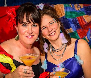 Two female expeditioners in a photo booth