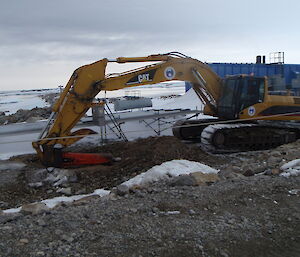 An escavator digging foundations