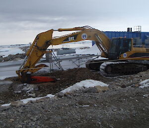 An escavator digging foundations