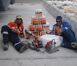 Two expeditioners relaxing after finishing the job.
