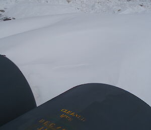 Fuel tanks surrounded by snow & ice
