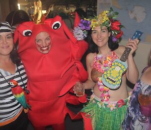 Four female expeditioners dressed up for nautical night