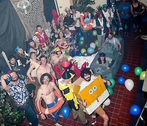 A large group of expeditioners dressed in various nautical themed costumes