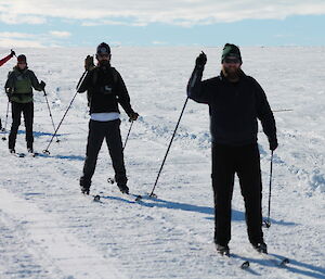 Four expeditioners on sking on the snow