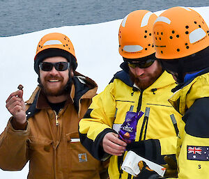 Expeditioners enjoying chocolate