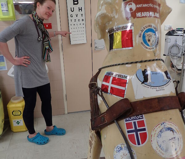 Antarctic mascot Stay, the fibreglass dog undergoes an eye test by station Doctor