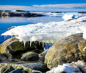 ice on rocks at the wharf